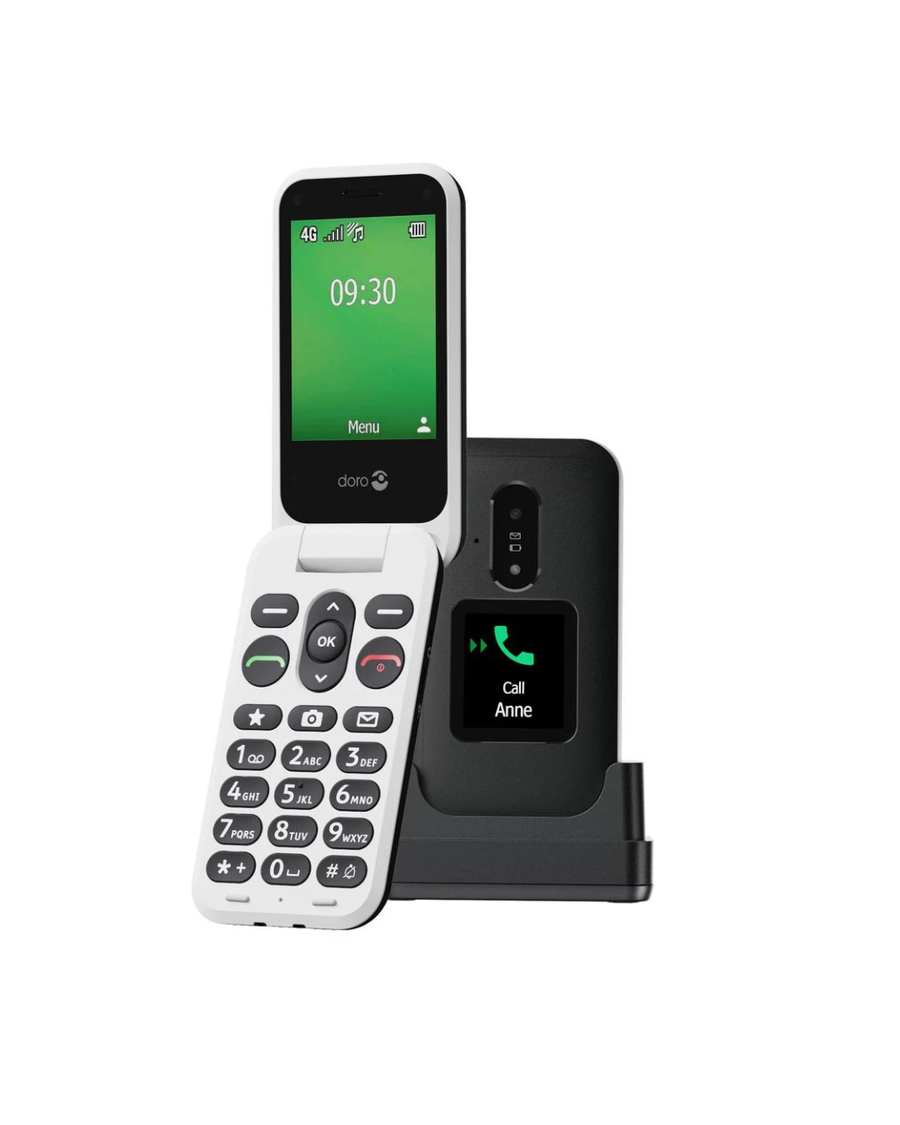 Doro Leva E30 in zwart en wit, met opengeklapt toestel, extern oproepscherm en laadstation